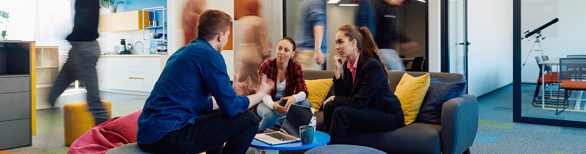 Colleagues discussing work together